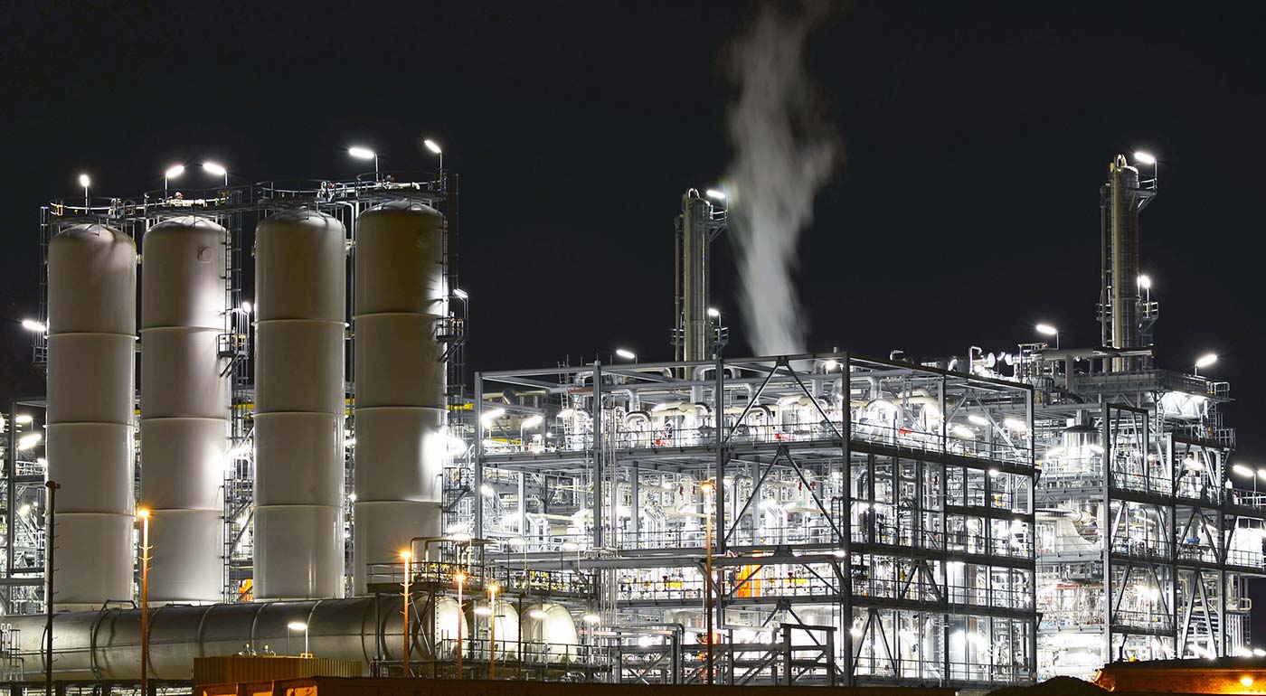 Petroleum refinery at night.