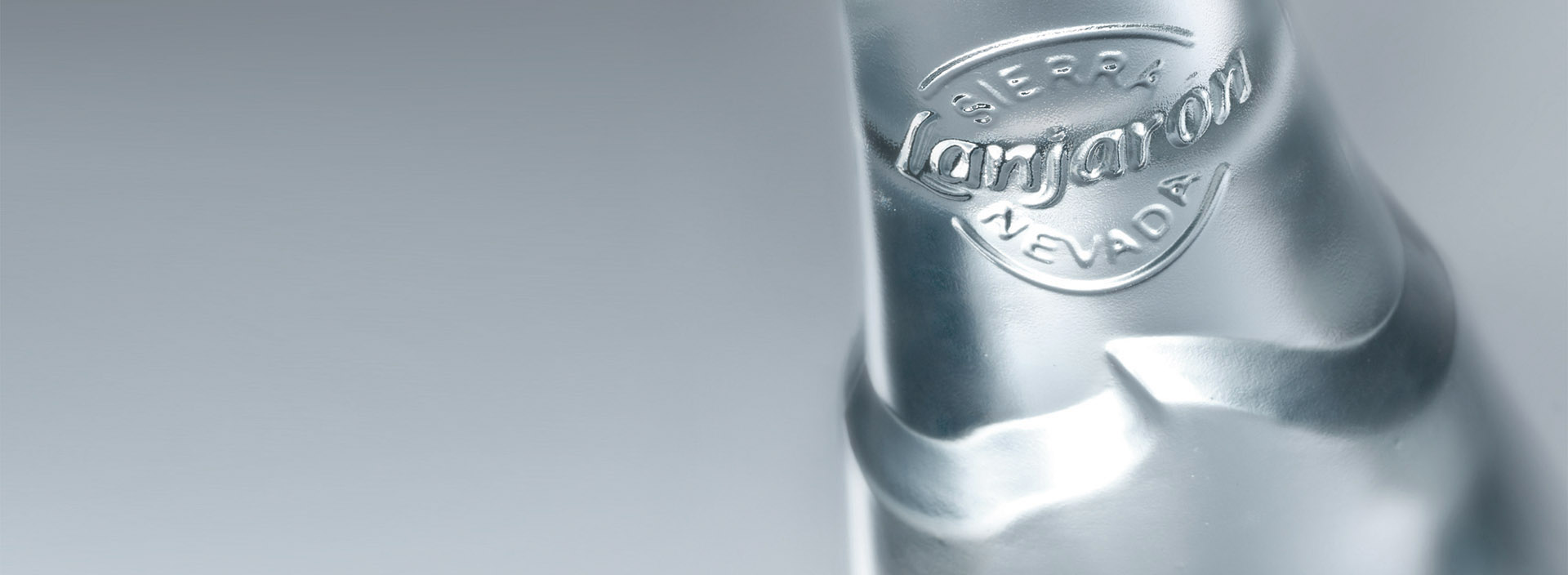 Design detail of a glass bottle for restaurants and catering.
